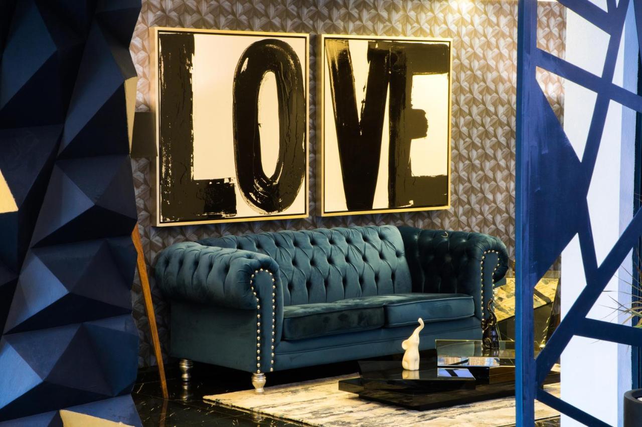 Rame Hotel Boutique Guadalajara Bagian luar foto The Love sofa