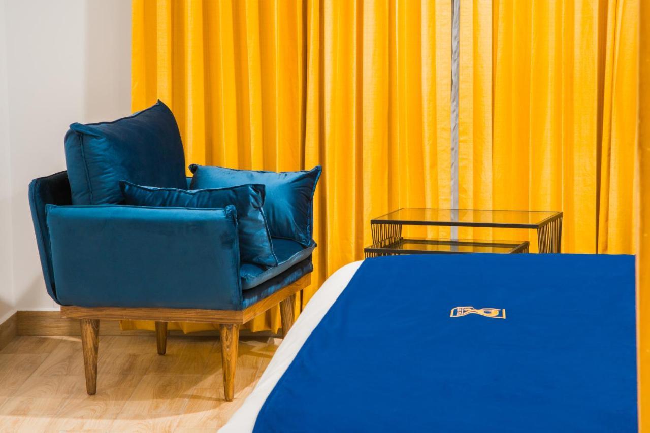 Rame Hotel Boutique Guadalajara Bagian luar foto A blue bedsheet