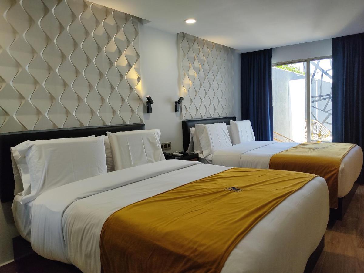 Rame Hotel Boutique Guadalajara Bagian luar foto Deluxe room